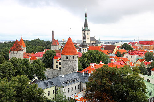 Tallinn city wall and St. Olaf's Church view. Aerial view of Tallinn skyline, Estonia