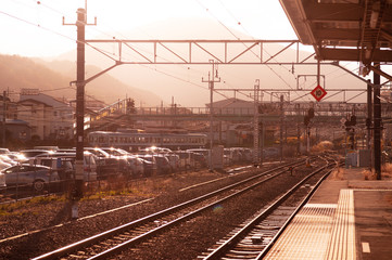 Fototapeta premium Empty Japan Otsuki train station platform warm sunlight in winter