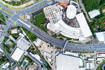 Drones Aerial View top down of road junction from above Image for transportation background,automobile traffic of many cars and sign,symbol on road