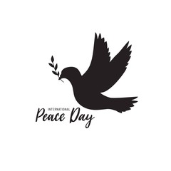 International Peace Day Typographic Design with dove and olive branch.