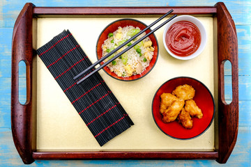 Fototapeta na wymiar Chinese Style Sweet and Sour Fried Chicken With Rice