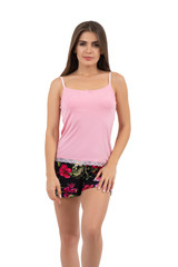 Fototapeta premium Young pretty brunette woman wearing pajamas isolated