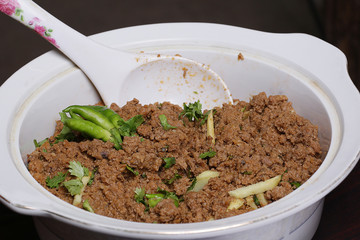 A spicy tasty beef keema mince in a bowl. This beef is traditionally served with someone.