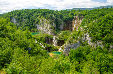 Fototapeta na wymiar Luxurious and tumultuous waterfalls of Plitvice Lakes, Croatia