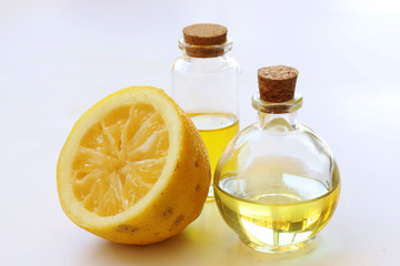Cut lemons and lemon oil in the bottle