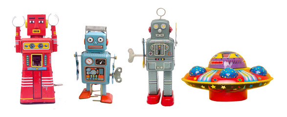 isolated robots and a UFO retro tin toys  © charles taylor