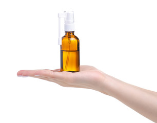 Throat spray medicine in hand on white background isolation