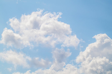 The white clouds in the sky in the afternoon.