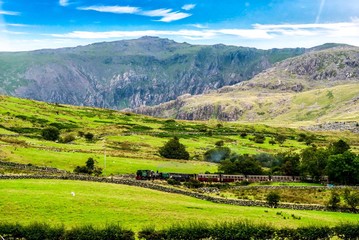 Obraz premium Train in the mountains