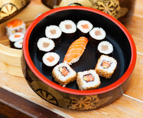 Japanese sushi on a rustic background.