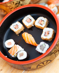 Japanese sushi on a rustic background.