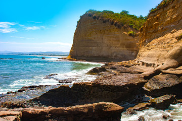 The village of Mantanita. The beaches of Ecuador. Republic of Ecuador. An island in the Pacific. Rocky cliffs. Coastal rocks. Coastline. South America. Equator. The Nature Of Ecuador.