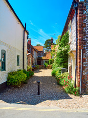 A courtyard to cottages off the high steert in Blakeney