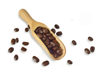 Coffee beans in wooden scoop isolated on white background