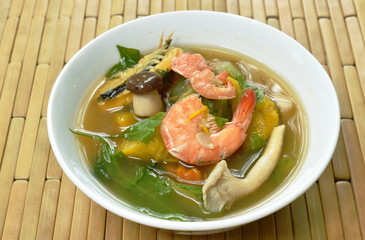 boiled spicy mixed vegetable with shrimp and smoked dry fish soup on bowl