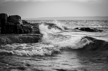 waves crashing on rocks