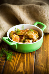 chicken fried in batter with dill on a plate