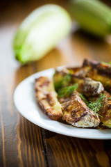 oven-baked zucchini in batter with garlic and herbs