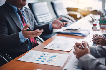 Group of business people at meeting assessment the state of business investment and marketing.