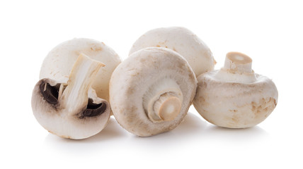 mashrooms whole and sliced champignons isolated on white background