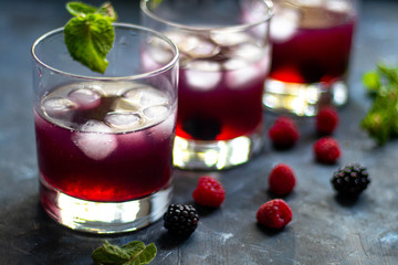 glass of red wine with berries