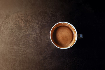 Hot Coffee Latte Cup on grunge Iron Table. Top View