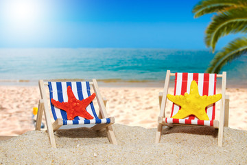 hammocks on the beach in tropical landscape
