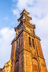 Details view of landmark Westerkerk Church in Amsterdam at sunset