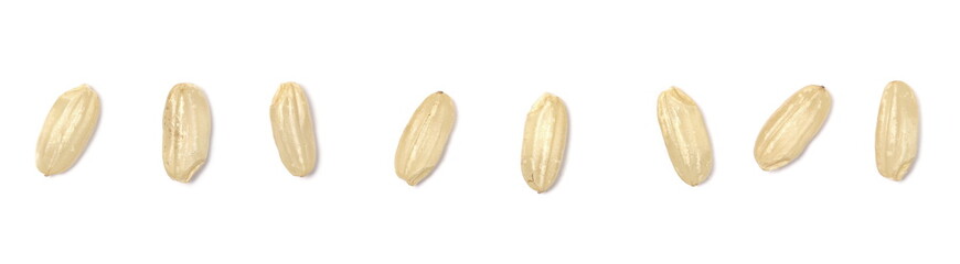 Set uncooked integral rice macro isolated on white background, top view