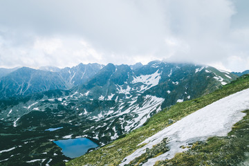 Beautiful view to group of glacial lakes from Kasprowy Wierch range.