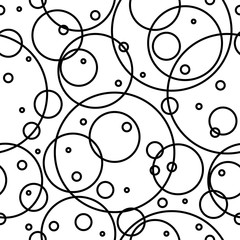 Seamless abstract pattern with black empty overlapping circles of different size.