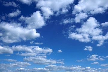 Naklejka na ściany i meble White clouds and blue sky - Stockphoto