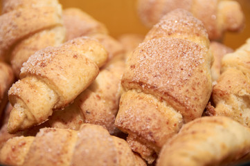 freshly baked croissants with sugar