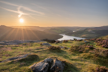 View of the Ashopton Viaduct, Ladybower Reservoir, and Crook Hill in the Derbyshire Peak District National Park.