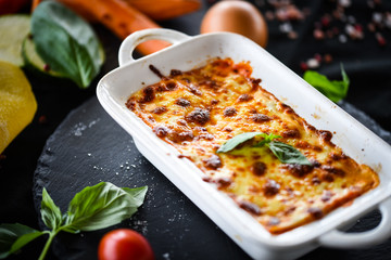 lasagna bolognese with fresh vegetables & mined beef meat