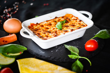 lasagna bolognese with fresh vegetables & mined beef meat