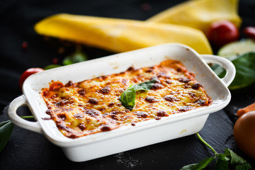 lasagna bolognese with fresh vegetables & mined beef meat