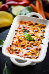 lasagna bolognese with fresh vegetables & mined beef meat