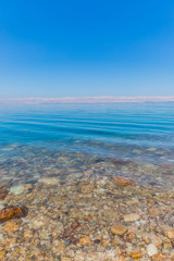 Obraz premium view of the coast of the Dead Sea resort area in Jordan 
