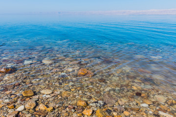 Naklejka na ściany i meble view of the coast of the Dead Sea resort area in Jordan 