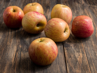 Apples close up  on the dark wooden table