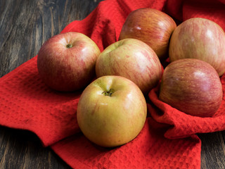 Apples   on the dark wooden table