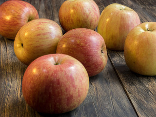 Apples close up   on the dark wooden table