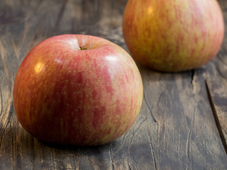 Apples close up   on the dark wooden table