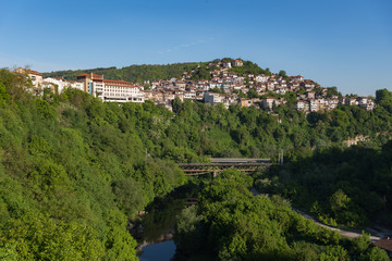 Fototapeta na wymiar Panoramic view of Veliko Tarnovo old town and bridge over Yantra river. Bulgaria