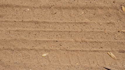 texture of sand bike tracks