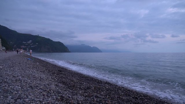 Black sea waves, Kvariati beach on a beautiful sunset.
