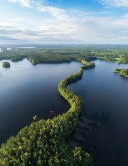 Top view of beutiful lakes and forest at sunrise. Beautiful sunrise in National park Liesjarvi. 