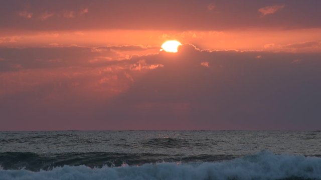 Beautiful sunrise at Black Sea coast - pristine nature, amazing seascape, gentle waves crushing in foreground - perfect for timelapse