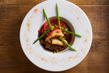 Sauteed Chicken Breast with Vegetables. View from above, top studio shot